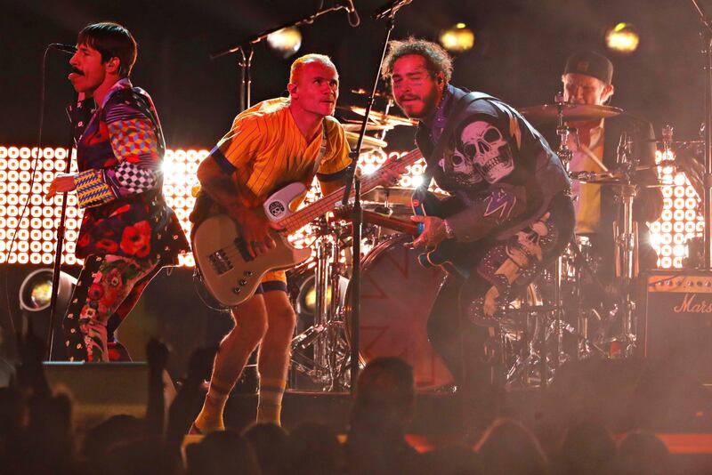 Anthony Kiedis and Flea of The Red Hot Chili Peppers perform with Post Malone. Photograph: Mike Blake/Reuters