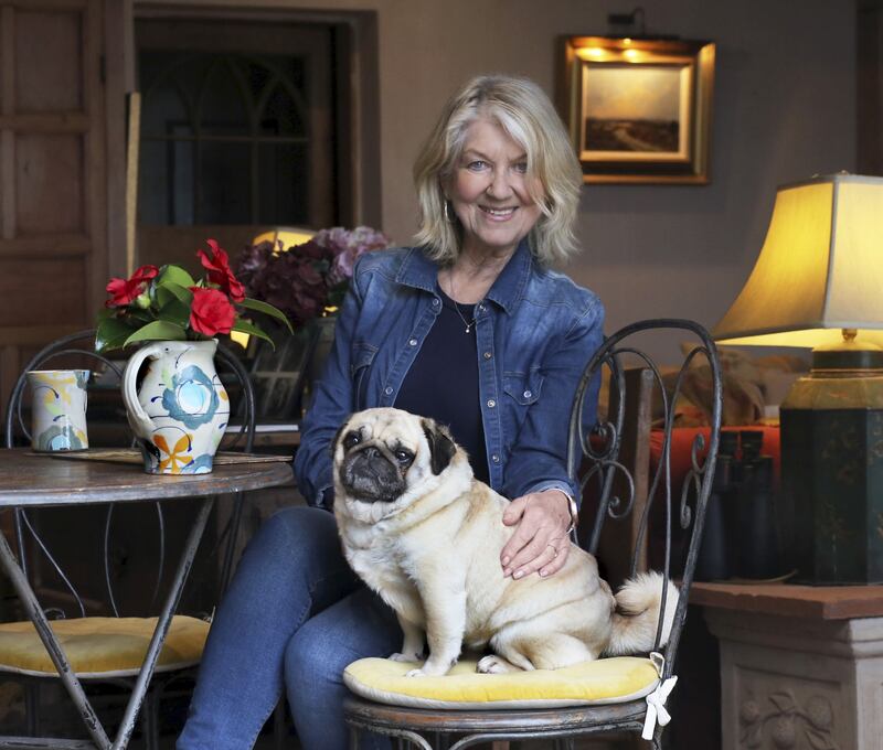 Artist and former RTÉ presenter Thelma Mansfield and her dog, Puffin. Photograph: Rod Morris