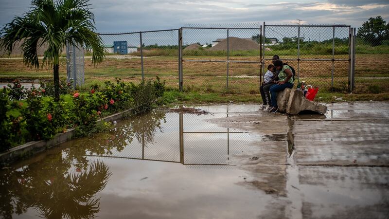 People deported from the United States after arriving at the airport in Port-au-Prince, Haiti on Sunday. Photograph: Federico Rios/New York Times