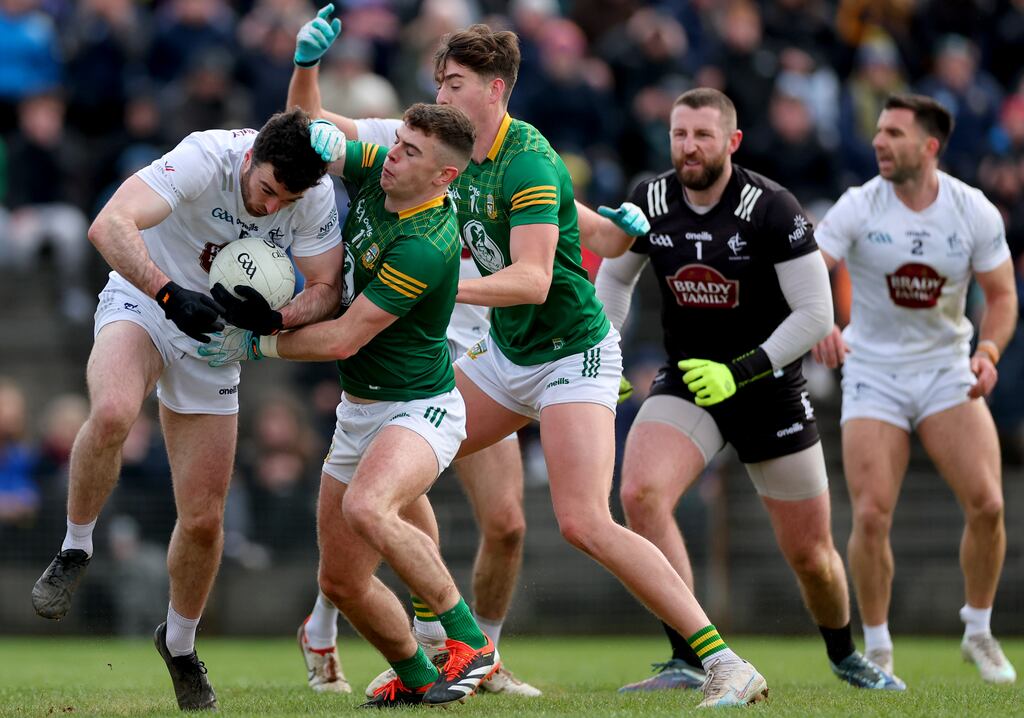Kildare’s Kevin Flynn with Eoghan Frayne and Daithí McGowan of Meath. Photograph: James Crombie/Inpho