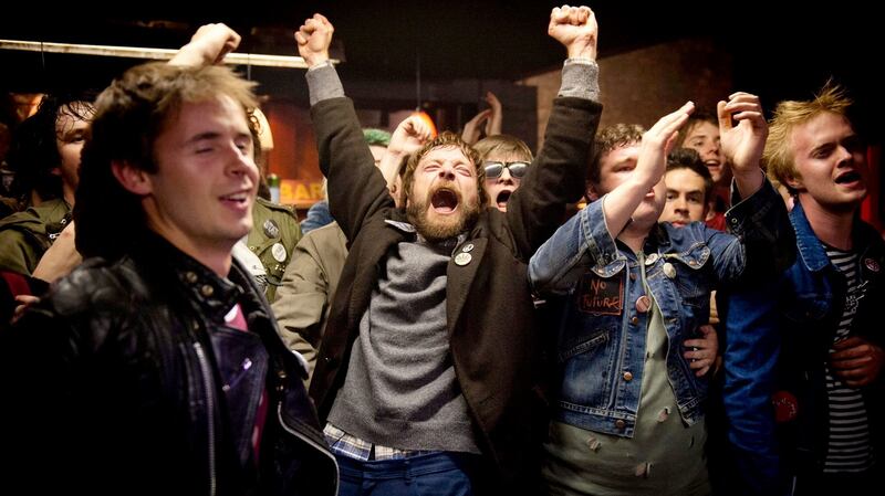 Richard Dormer, centre, as Terri Hooley in the film Good Vibrations (2012)