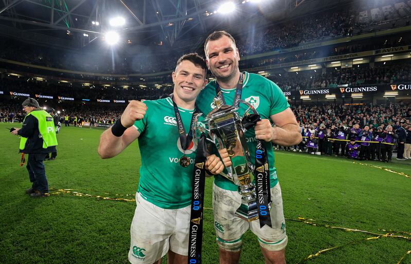 Calvin Nash and Tadhg Beirne celebrate Ireland's Six Nations title win at the Aviva Stadium. Photograph: Dan Sheridan/Inpho