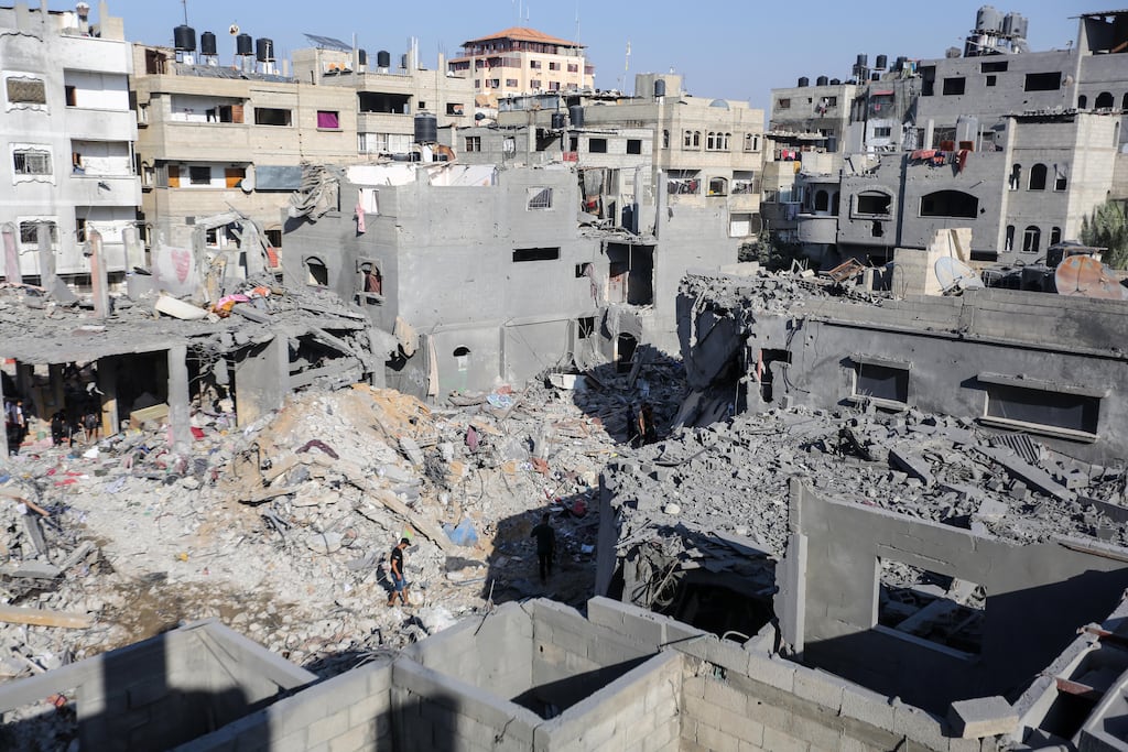 A view of buildings that were destroyed during Israeli air raids in the southern Gaza Strip on Wednesday.  There are differences on how the Euopean Union should respond to the continuing bombardment of Gaza, with no clear view emerging on if the bloc should call for a ceasefire. Photograph: Ahmad Hasaballah/Getty Images