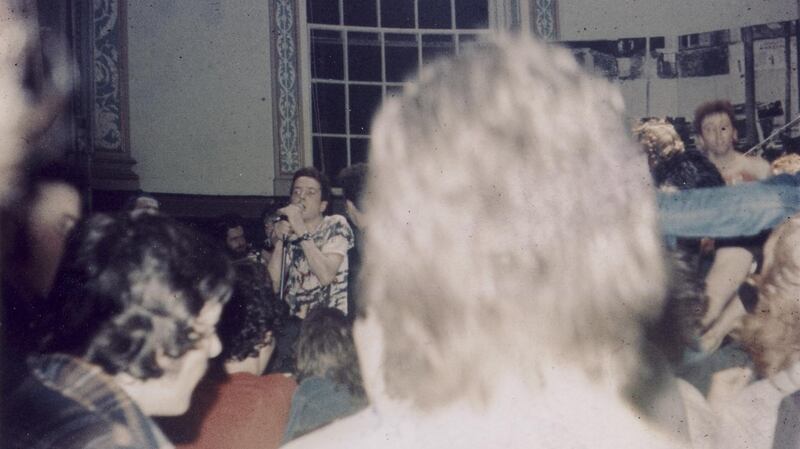 The Clash singer Joe Strummer (centre) on stage in the Exam Hall, Trinity College Dublin, October 21st, 1977. File photograph: Des O’Rourke