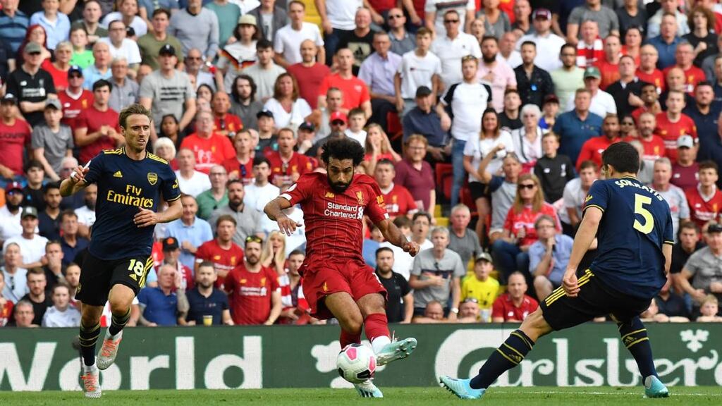 Mohamed Salah scores Liverpool’s third against Arsenal. Photograph: Ben Stansall/AFP/Getty