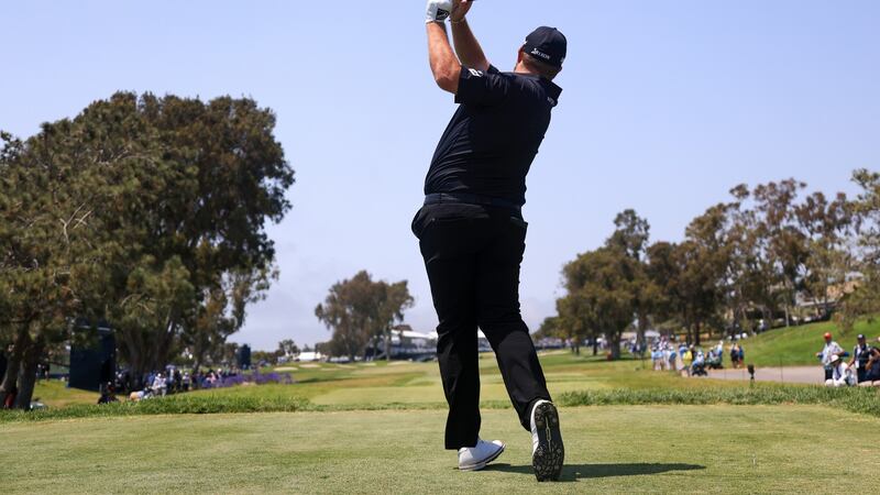 Shane Lowry tees off on the 18th. Photo: Sean M. Haffey/Getty Images