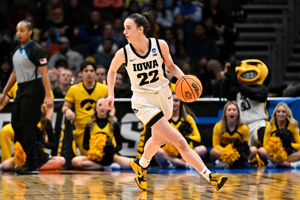 Caitlin Clark of the Iowa Hawkeyes dribbles against the Louisville Cardinals. Photograph: Alika Jenner/Getty Images