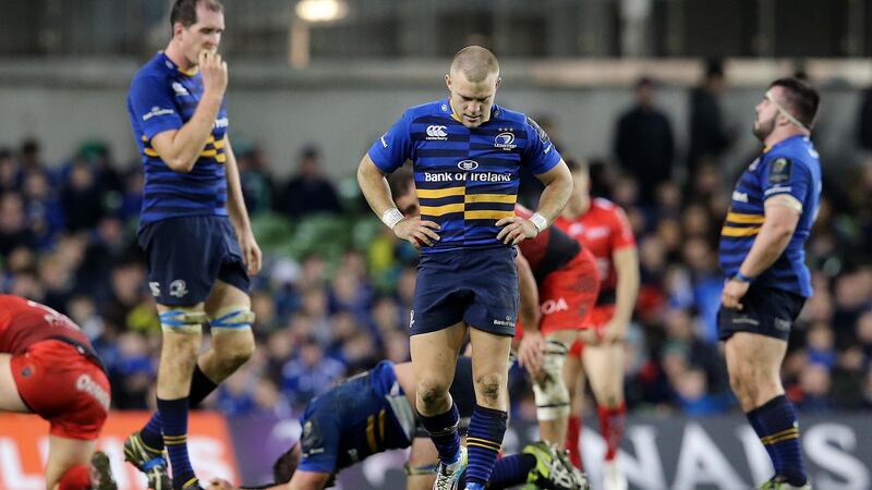 Leinster players Devin Toner and Ian Madigan show their dejection following the home defeat to Toulon in December, 2015. Photograph: Ryan Byrne/Inpho