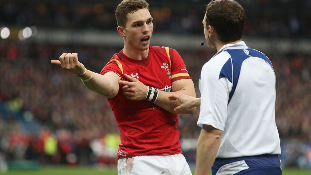 Wales’ George North complains about an alleged bite during Saturday’s game at the Stade de France. Photograph: PA