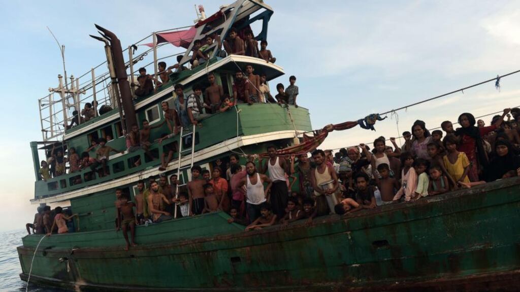 A boat carrying hundreds of Rohingya migrants from Burma drifting in Thai waters in the Andaman Sea. Photograph: Christophe Archambault/AFP/Getty Images