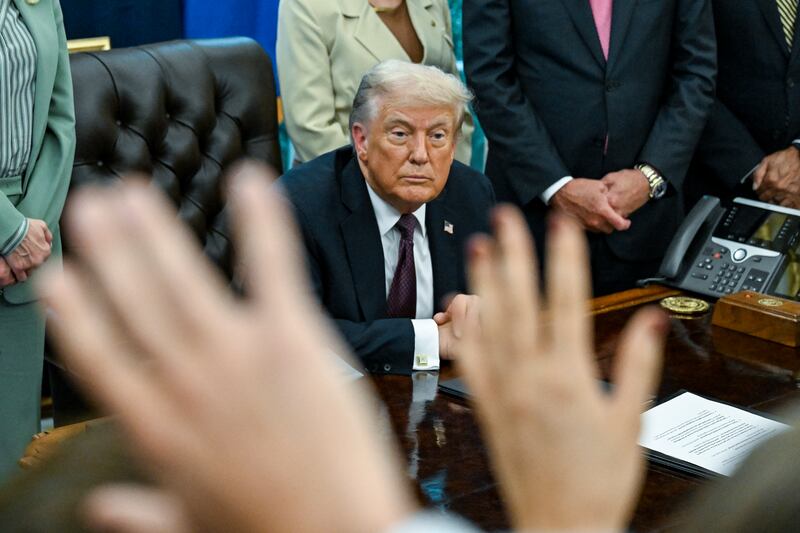 US president Donald Trump speaks to reporters  in the Oval Office of the White House on Monday. Photograph: Kenny Holston/The New York Times