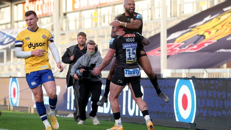 Exeter Chief’s Stuart Hogg celebrates scoring his side’s third try with team mate Tom O’Flaherty during their Premiership semi-final at Sandy Park. Photograph: PA