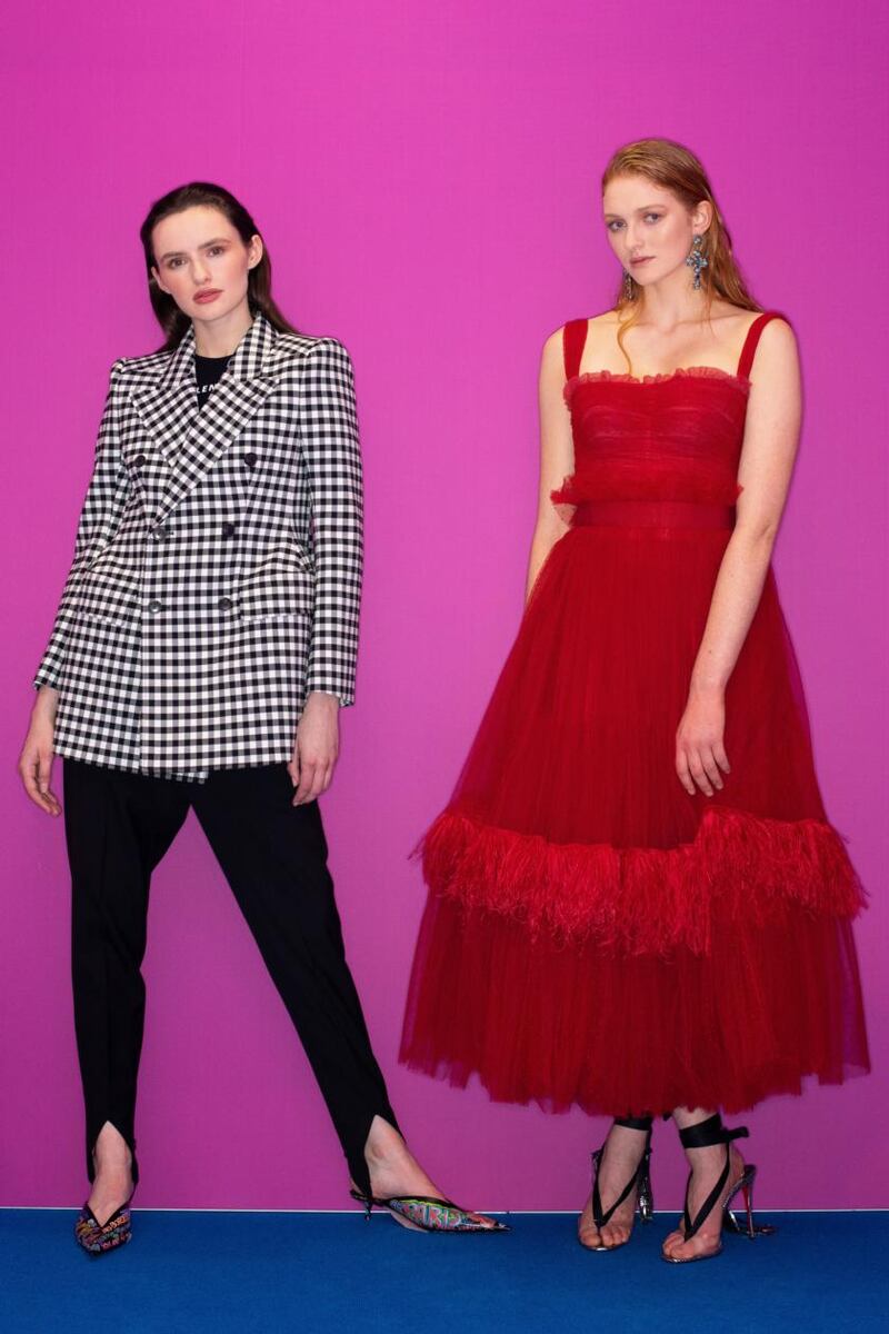 Brown Thomas S/S 2019: Model Maria Traynor wears a Balenciaga black and white check blazer, black trousers and model Aine O’ Gorman wears Dolce & Gabbana long red dress. Photograph: Tom Honan/The Irish Times