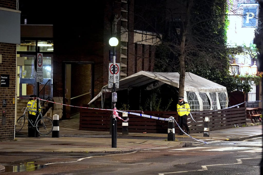 Police near to the scene of a suspected drive-by shooting in Phoenix Road, next to Euston station in north London on Saturday. Photograph: James Manning/PA