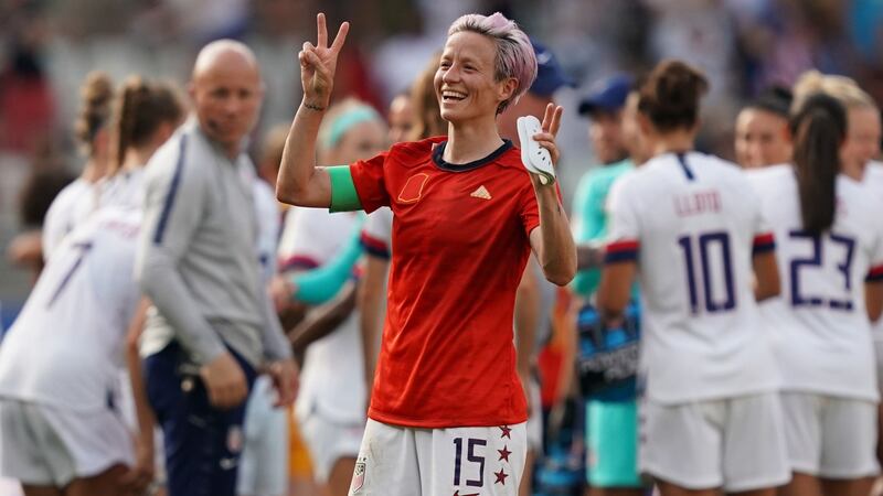 Rapinoe celebrates at the end of the win over Spain. Photo: Lionel Bonaventure/Getty Images