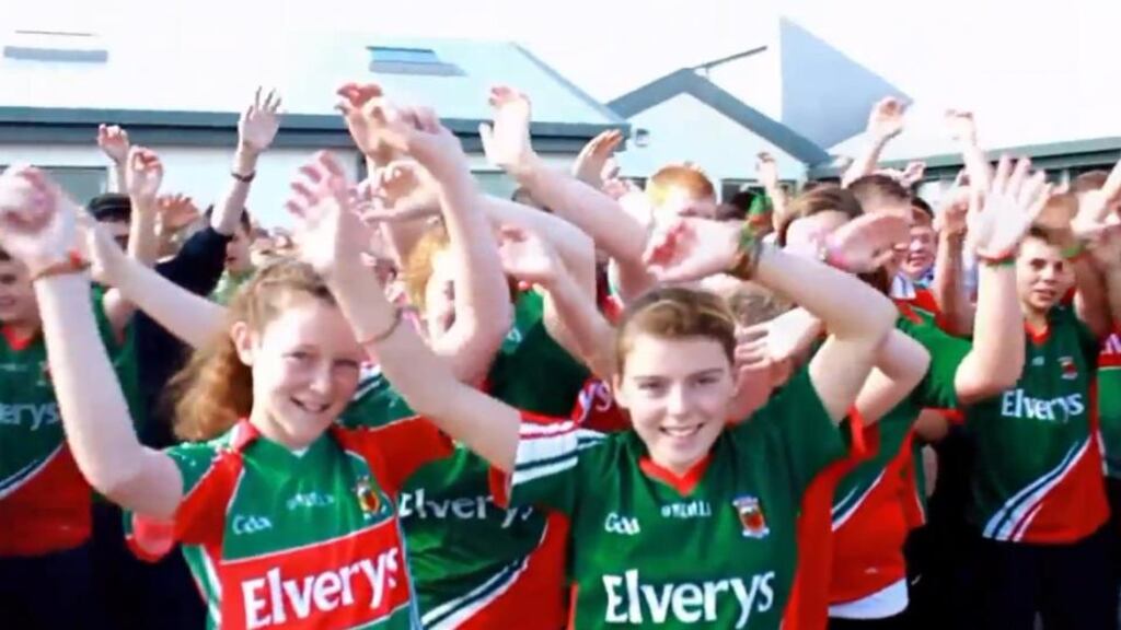 Schoolchildren sing along to Time to say Mayo in the county yesterday.