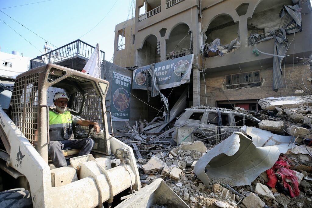 Rescuers work at the site of an Israeli military strike in Qana town, southern Lebanon. According to the Lebanese Ministry of Health, more than 2,350 people have been killed and over 10,906 have been injured in Lebanon since the start of hostilities. Photograph: Shutterstock