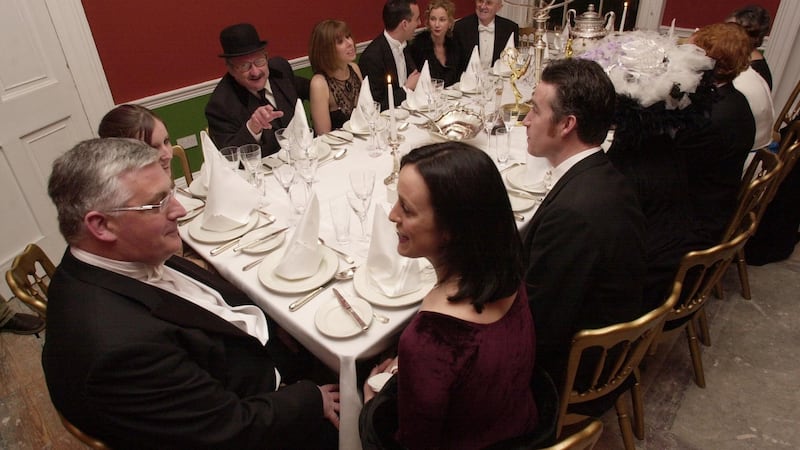 Brendan Kilty, who bought 15 Usher’s Island in 2000, talking to actor Rachael Dowling who played the part of Lilly in the film version of “The Dead”, at a 2004 recreation of the famous dinner scene in the house. Photograph: Bryan O’Brien