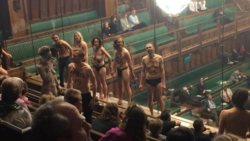 Extinction Rebellion activists strip off in House of Commons public gallery on Monday. Photograph: Extinction Rebellion via Reuters.