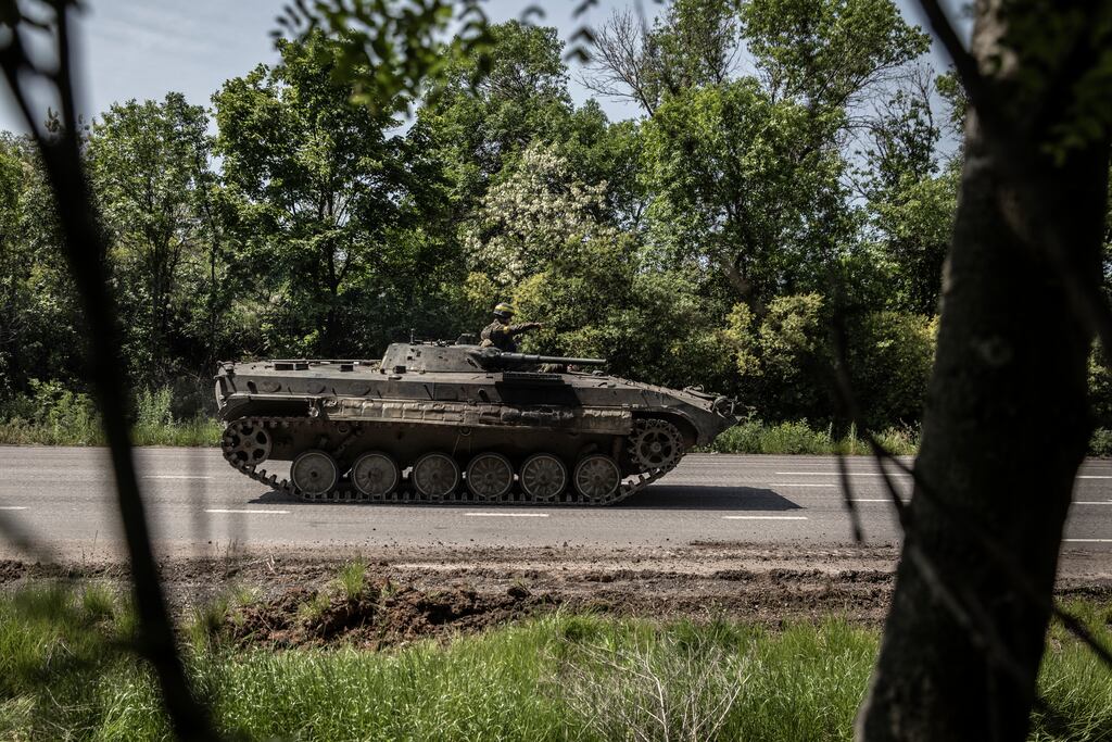 A Ukrainian armoured personnel carrier drives along a road leading to Sevierodonetsk, in eastern Ukraine, on Monday, May 30th. The battered city of Sievierodonetsk has been in Russia’s cross hairs for weeks, pounded by the full might of Moscow’s artillery. Photograph: Finbarr O'Reilly/The New York Times