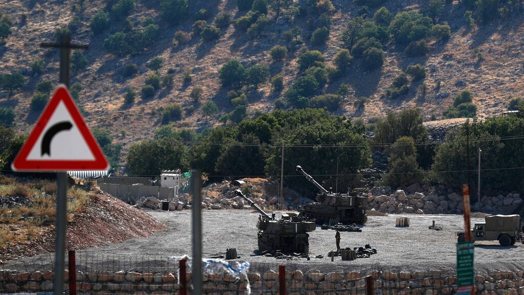 Israeli soldiers with their artillery unit deployed at the Israeli-Syrian border, in the Golan Heights, north of Israel, on Sunday. Photograph: Atef Safadi/EPA