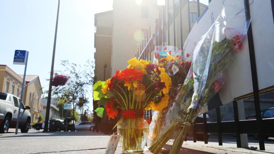 A makeshift memorial  outside the Library Gardens Apartments, where a balcony collapsed, in downtown Berkeley, California, killing six Irish students. Photograph: Jim Wilson/The New York Times