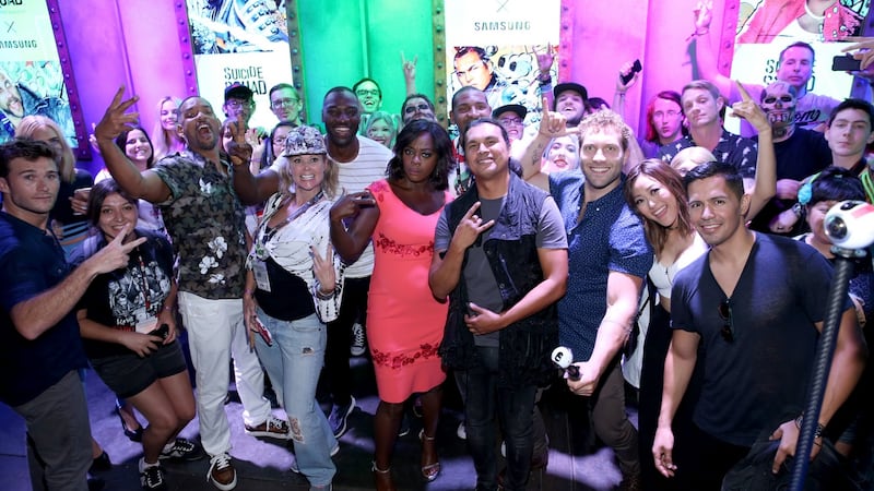 Actors Adam Beach, Joel Kinnaman, Scott Eastwood, Adewale Akinnuoye-Agbaje, Jay Hernandez, Jai Courtney, Karen Fukuhara, Viola Davis, Will Smith, and Margot Robbie pose with fans at San Diego Comic-Con 2016. Photograph: y Jonathan Leibson/Getty Images/Samsung