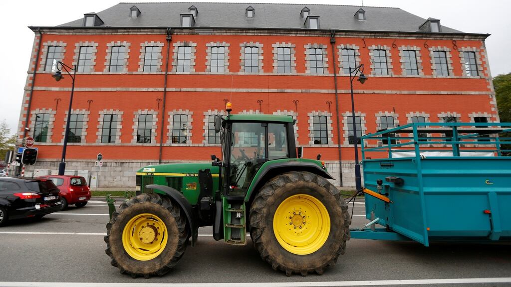 Protesting farmers parked tractors outside the Walloon regional parliament in Namur, Belgium as deputies debated the Ceta trade agreement between the EU and Canada. On Friday, lawmakers rejected the deal. Photographer: Reuters/François Lenoir