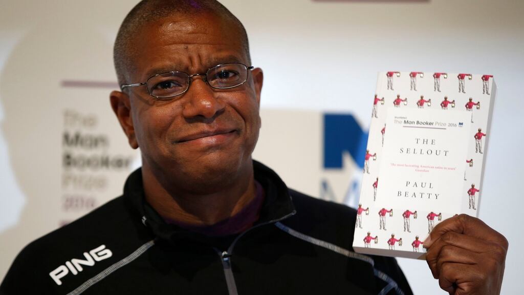 Man Booker prize 2016 winner Paul Beatty with his book The Sellout. Photograph: Alastair Grant/AP