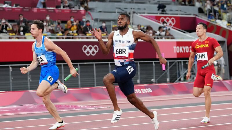Tortu Filippo goes past Britain’s Nethaneel Mitchell-Blake to claim gold for Italy in the final of the men’s 4x100m. Photograph: Martin Rickett/PA Wire