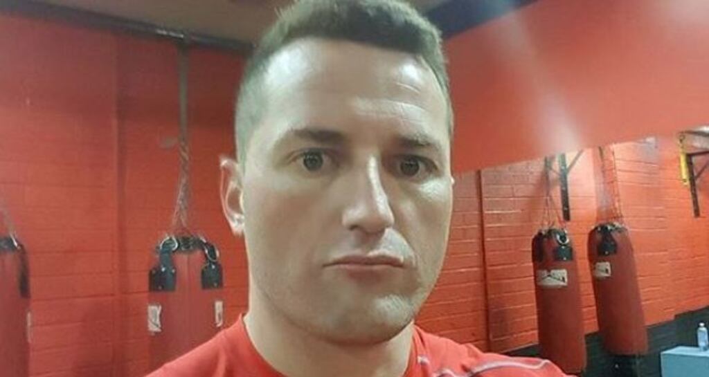 Gangland figure Robbie Lawlor was murdered at an appointment he arranged while exchanging cash with a man in a supermarket car park, a Belfast court has heard.