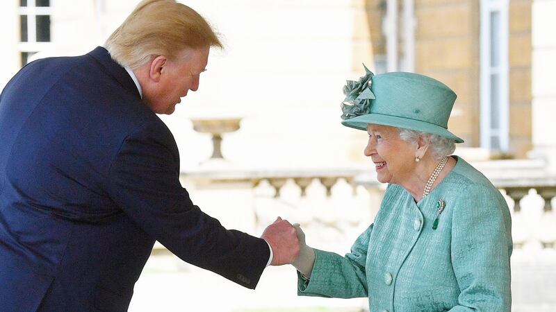 Queen Elizabeth greets Donald Trump as he arrives at Buckingham Palace. Photograph: Victoria Jones/PA Wire