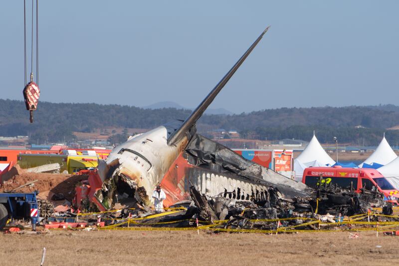 The crash site of the Jeju Air flight at Muan International Airport in Muan, South Korea. The plane, carrying 181 people, crashed while landing on Sunday, killing most of those on board. Photograph: Chang W. Lee/The New York Times