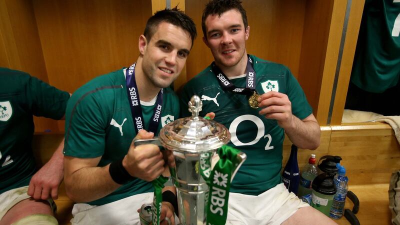 O’Mahony with Conor Murray and the Six Nations trophy in Paria in 2014. Photo: Dan Sheridan/Inpho