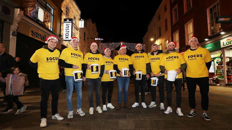 Members of the Irish rugby team joined the Focus Ireland team to help in their efforts to raise funds this Christmas.  Photograph: Nick Bradshaw/The Irish Times