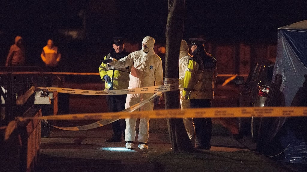 Members of the Garda Forensic Unit on Thursday night at the scene of the shooting  on St Ronan’s Drive in Ronanstown, west Dublin. Photograph: Dave Meehan
