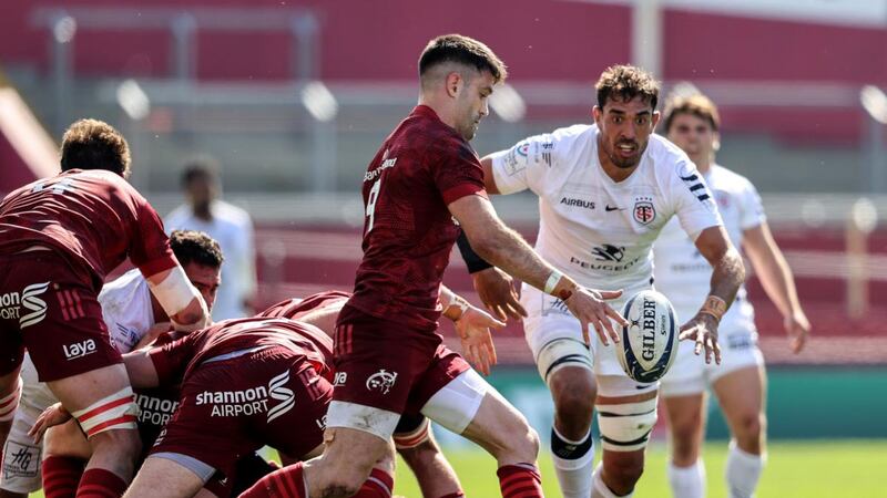 Munster’s Conor Murray prepares to box kick as Richie Arnold of Toulouse closes in during the Heineken Champions Cup round of 16 loss to Toulouse at Thomond Park. Photograph: Dan Sheridan/Inpho