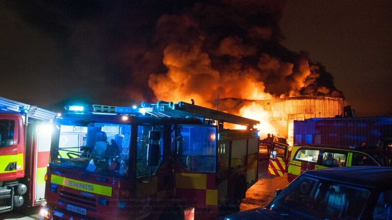 Fire services battle a large blaze at a recylcing centre at the Greenogue Business Park in Rathcoole, Co Dublin. Photograph: Dublin Fire Brigade/Twitter