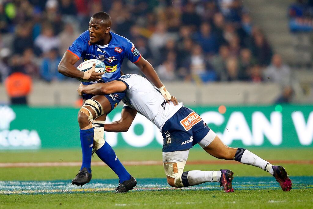 Hacjivah Dayimani of the DHL Stormers is tackled by Harold Vorster of the Vodacom Bulls during the URC final in Saturday's Grand Final in Cape Town. Photograph: Steve Haag/Inpho