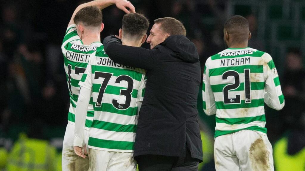 Celtic’s Mikey Johnston is congratulated by his manager Brendan Rodgers after scoring twice at Celtic Park. Photograph: PA