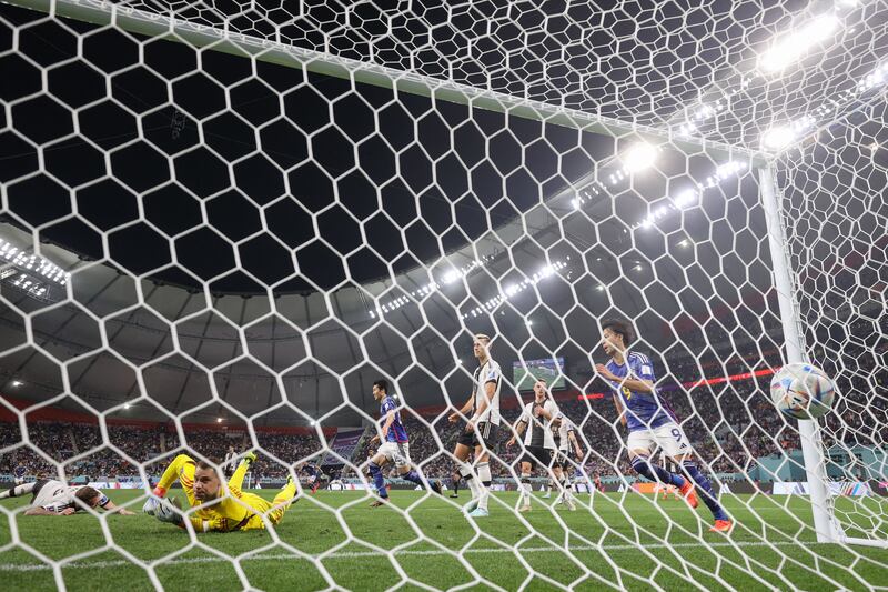 Germany's goalkeeper Manuel Neuer concedes the first goal during the World Cup Group E match against Japan at the Khalifa International Stadium in Doha. Photograph: Adrian Dennis/AFP via Getty Images