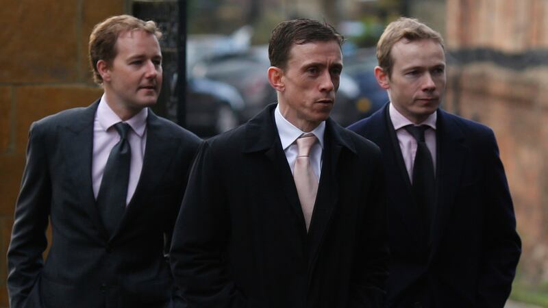 Jockey’s Tom Queally, Shane Kelly and Jamie Spencer arrive for the funeral service for Pat Eddery held at St Mary the Virgin Church, Thame, Oxfordshire. Photograph: Julian Herbert/PA Wire