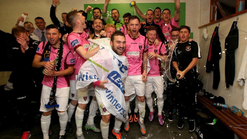 Wexford Youths players celebrate winning promotion to the Premier Division after victory over Athlone Town at Ferrycarrig Park on Friday. Photograph: Ryan Byrne/Inpho