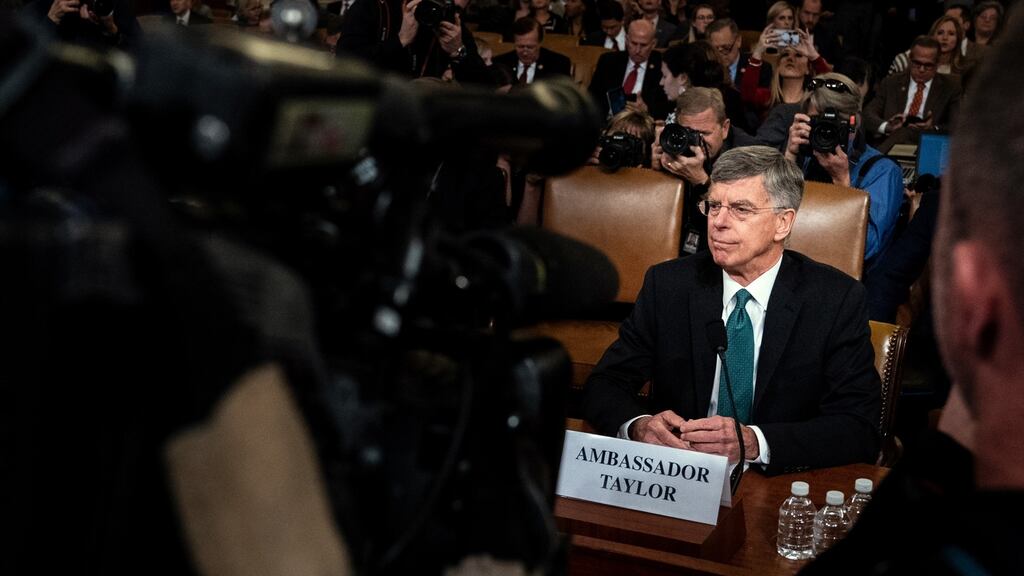 William Taylor appears before the House intelligence committee in Washington: Lawmakers are considering whether to impeach President Donald Trump. Photograph: Erin Schaff/New York Times