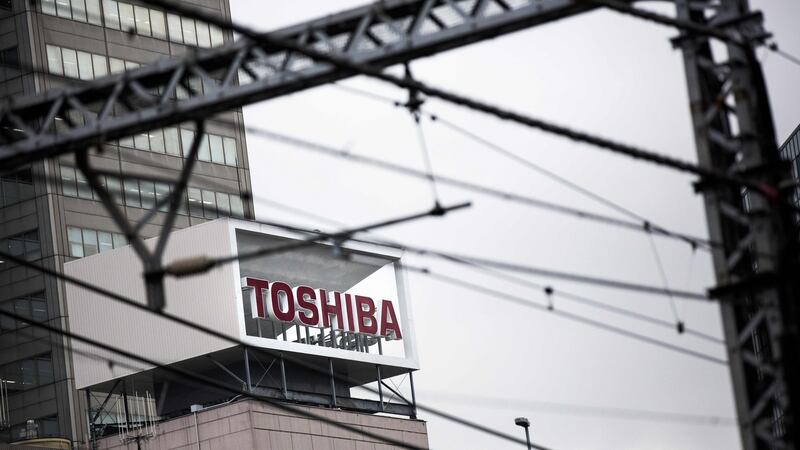 Toshiba: shares at the company fell over 10 per cent on the Tokyo market on Thursday following media reports of expanding losses at its US nuclear power business. Photograph: Behrouz Mehri/AFP/Getty Images