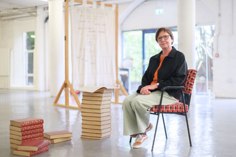 Artist Helen Doherty with her work MeanTime: A Short Encyclopedia of Contested Words