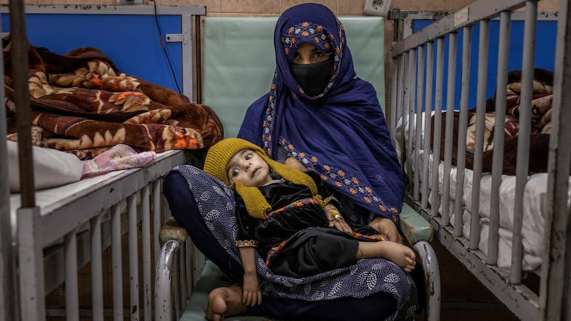 Soraya (2) and her mother Sara (17) in the malnutrition ward of the Indira Gandhi Children’s Hospital in Kabul. Photograph: Jim Huylebroek/New York Times