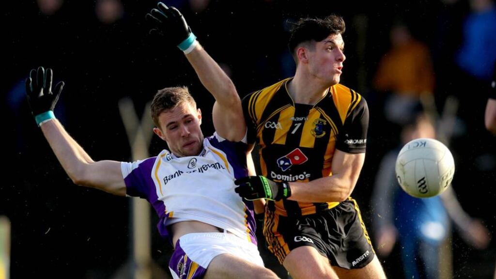 Séamus Lavin of  St Peter’s Dunboyne   fouls Paul Mannion of Kilmacud Crokes to concede a penalty during the AIB  Leinster Club SFC quarter-final at  Páirc Taliteann in Navan. Photograph:  Ryan Byrne/Inpho