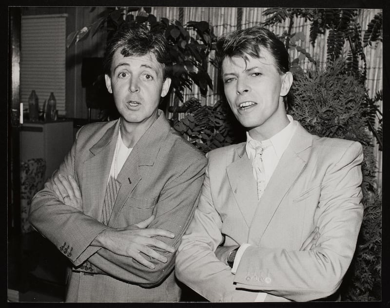 Paul McCartney and David Bowie backstage at Wembley. Photograph: Dave Hogan/Band Aid Archive courtesy © The National Library of Ireland