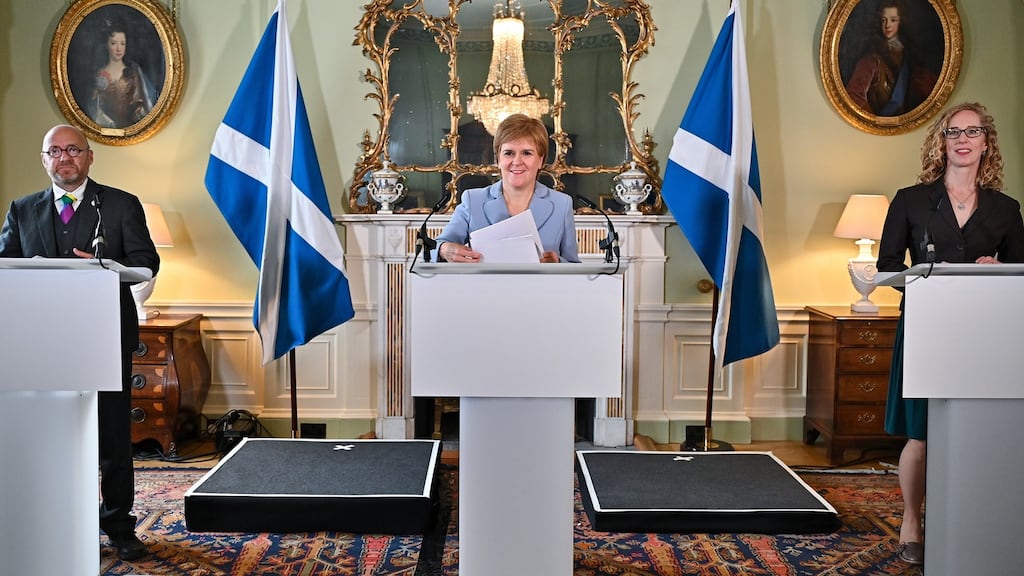 First minister of Scotland Nicola Sturgeon holds a media briefing with Scottish Greens co-leaders Patrick Harvie and Lorna Slater. Photograph: Jeff J Mitchell/Pool/Getty